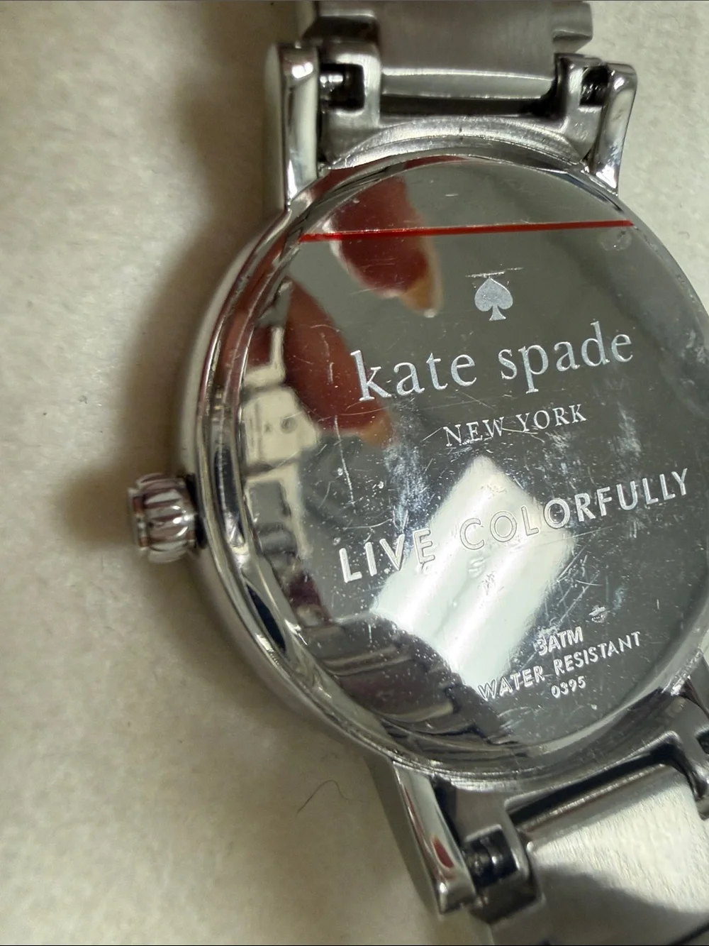 kate spade Silver and Mother of Pearl Round Bracelet Watch